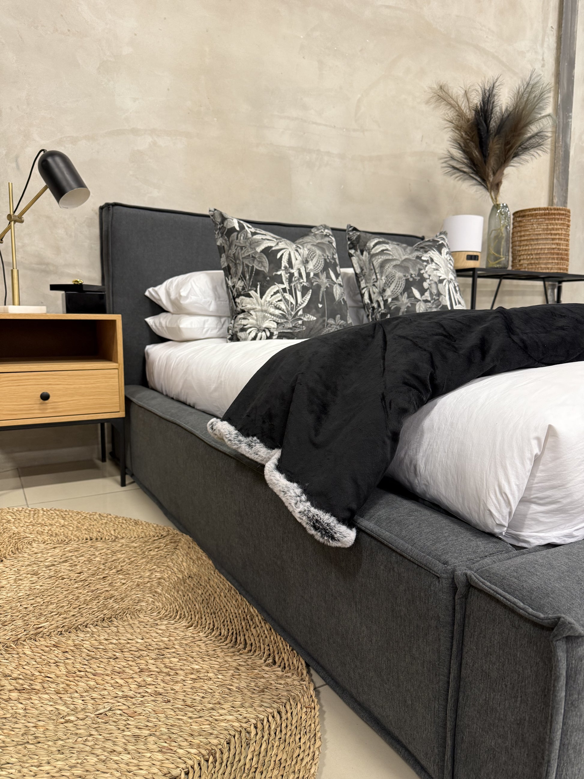 Modern Luka bed with lip stitching detail, perfect for contemporary bedroom decor.