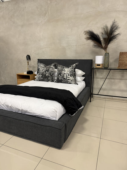 Luxurious Luka Upholstered Bed Set with detailed lip stitching and modern design.