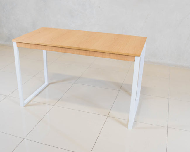 Ivan Desk with a melamine surface and strong steel legs, perfect for efficient home office setups.